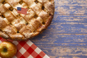 US flag on a latice crust apple pie. American as apple pie self-employed concept