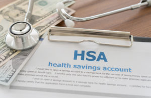 HSA contribution increases on doctor's clipboard