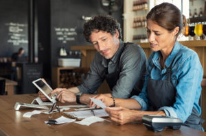 small business owner doing finances 401k