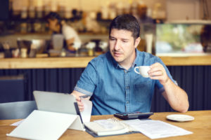 small bussiness owner reviewing taxes looking for tax credits